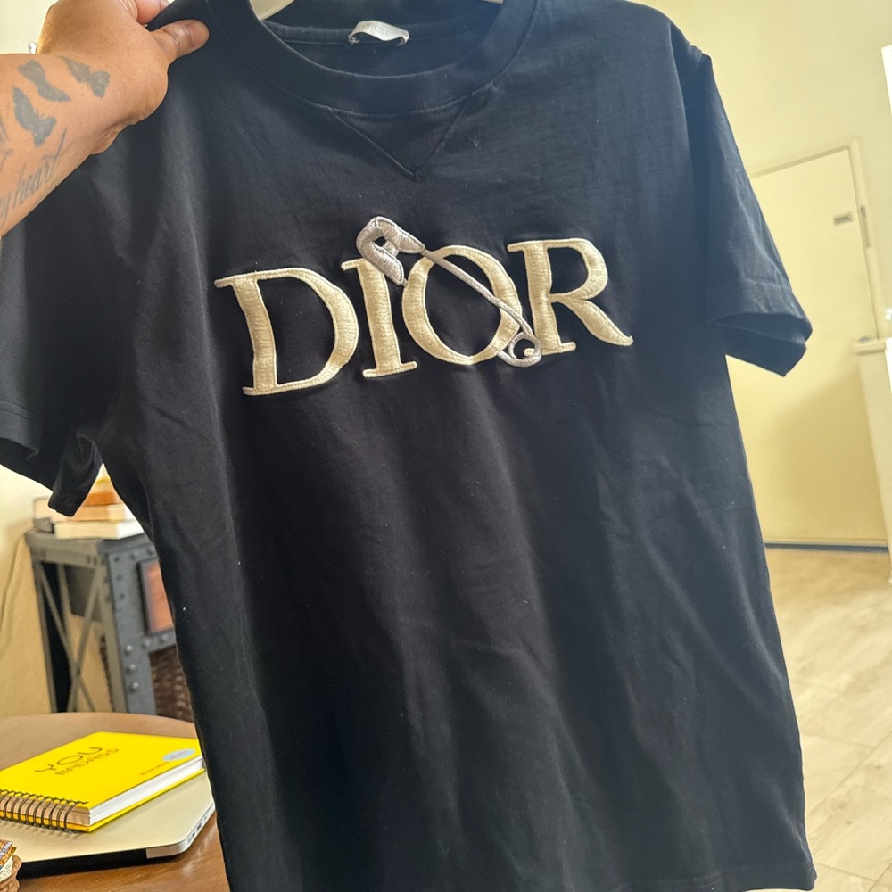 Black with White embroidered DIOR with pin 
Dior X Judy Blue collection
Size S
